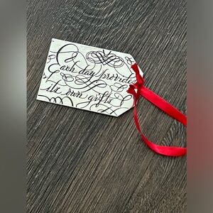 Neiman Marcus Silver Tone gift tag shaped Ornament. 2in x 3 in.